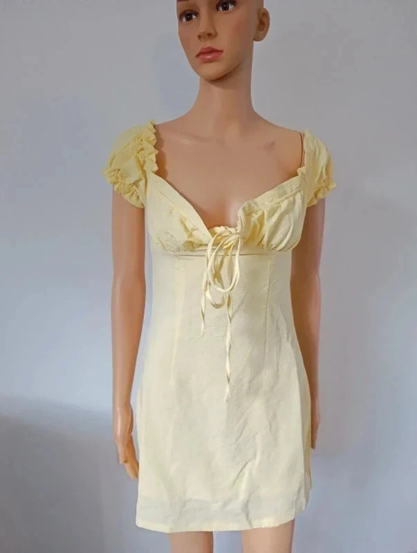 Pastel geel Street jurk T.34/XS – Corsetstijl, pofmouwen, romantische minijurk – photo 2